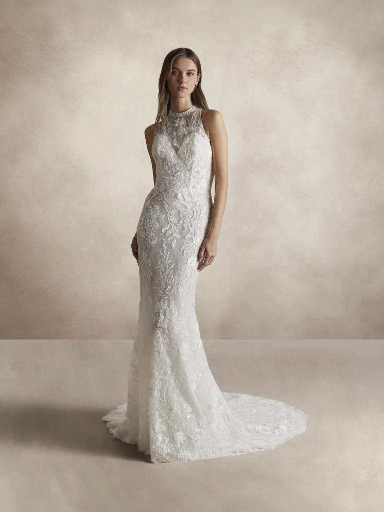 Abito-da-sposa-sirena-Nicole-Couture-con-collo-halter-in-pizzo-sakina